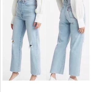 New never worn. Ribcage straight Levi’s with a raw hem. New with tags. 27x27